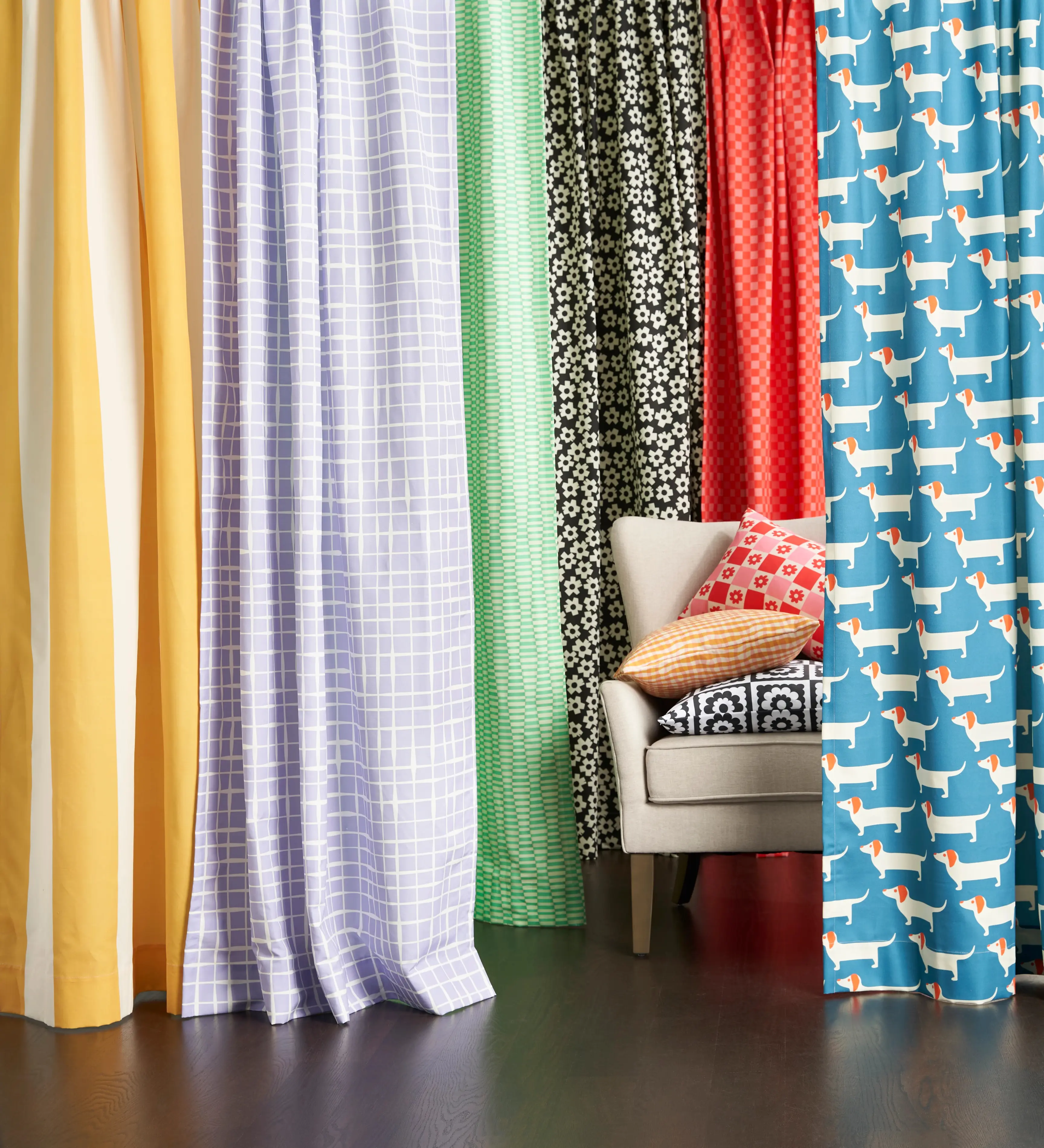 Colorful curtains with different patterns hanging